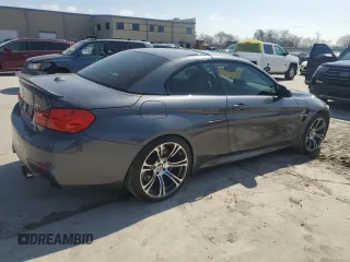 2015 BMW M4 z VIN WBS3U9C58FP967218, wystawiony jako Copart lot #49249725 z przebiegiem 152 320 mil mil oraz Tytuł czysty. Historia ofert i sprzedaży dostępna na DreamBid. Obrazek 3.