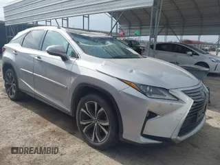 2019 Lexus RX with VIN 2T2ZZMCA3KC135292, listed as a IAAI auction lot 41573153 with 106,971 mi miles. Bid and sale history available at carsss.com. Image 1.