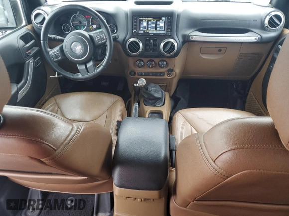 2017 Jeep Wrangler Unlimited Sahara with VIN 1C4BJWEG9HL633296, listed as a Copart auction lot 61387685 with 74,035 mi miles and Salvage title. Bid and sale history available at DreamBid. Image 8.