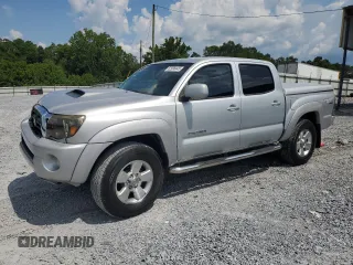 2007 Toyota Tacoma z VIN 3TMLU42N97M010387, wystawiony jako Copart lot #62998445 z przebiegiem 264 071 mil mil oraz Szkoda całkowita • Salvage title. Historia ofert i sprzedaży dostępna na DreamBid. Obrazek 1.