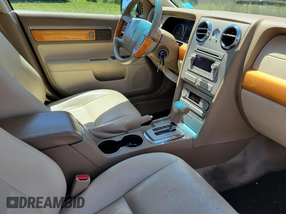 2007 Lincoln MKZ with VIN 3LNHM26T77R667027, listed as a IAAI auction lot 42176330 with 42,852 mi miles and . Bid and sale history available at carsss.com. Image 5.
