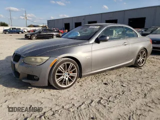 2011 BMW 3 Series 335i with VIN WBADX7C5XBE580244, listed as a Copart auction lot 44993215 with 124,091 mi miles and Salvage Title. Bid and sale history available at carsss.com. Image 1.