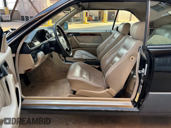 1995 Mercedes-Benz E 320 with VIN WDBEA66E8SC239370, listed as a Copart auction lot 55871605 with 119,102 mi miles and Salvage Title. Bid and sale history available at DreamBid. Image 7.