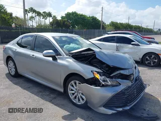 2019 Toyota Camry LE with VIN 4T1B11HK4KU249720, listed as a IAAI auction lot 41940728 with 35,891 mi miles and . Bid and sale history available at DreamBid. Image 1.
