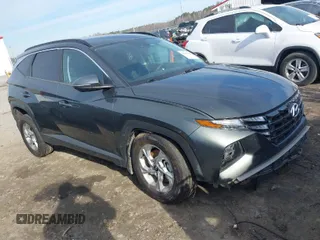 2022 Hyundai Tucson SEL with VIN 5NMJBCAEXNH031855, listed as a IAAI auction lot 41677386 with 40,606 mi miles and . Bid and sale history available at DreamBid. Image 1.