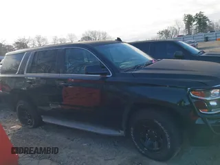2015 Chevrolet Tahoe Commercial z VIN 1GNLC2EC4FR535329, wystawiony jako IAAI lot #41643486 z przebiegiem 185 326 mil mil oraz . Historia ofert i sprzedaży dostępna na DreamBid. Obrazek 13.