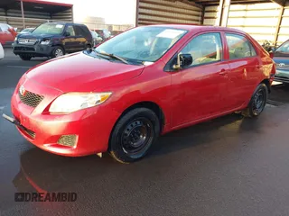 2010 Toyota Corolla with VIN 1NXBU4EEXAZ328590, listed as a IAAI auction lot 41667609 with 60,669 mi miles and . Bid and sale history available at DreamBid. Image 2.