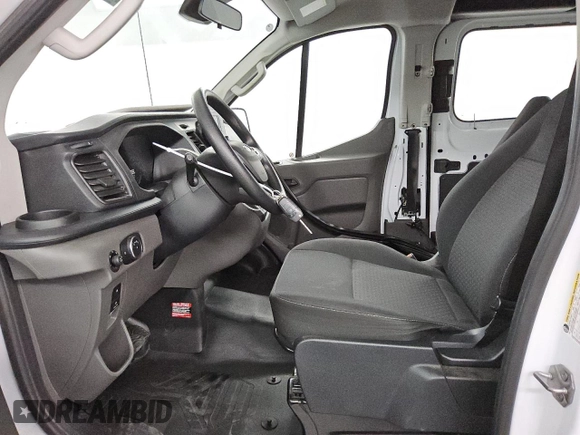 2023 Ford Transit Cargo with VIN 1FTBR1Y86PKB40356, listed as a Copart auction lot 45669345 with 12,890 mi miles and Salvage Title. Bid and sale history available at DreamBid. Image 7.