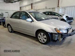 2009 Kia Spectra EX with VIN KNAFE221X95650545, listed as a Copart auction lot 74496974 with 203,752 mi miles and Non Repairable. Bid and sale history available at carsss.com. Image 4.
