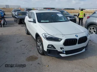 2020 BMW X2 sDrive28i z VIN WBXYH9C07L5P35810, wystawiony jako IAAI lot #42043222 z przebiegiem 101 329 mil mil oraz . Historia ofert i sprzedaży dostępna na DreamBid. Obrazek 1.