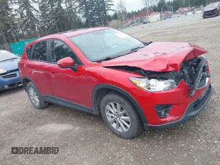 2016 Mazda CX-5 Touring with VIN JM3KE4CY2G0894930, listed as a IAAI auction lot 41906809 with 123,125 mi miles. Bid and sale history available at carsss.com. Image 1.