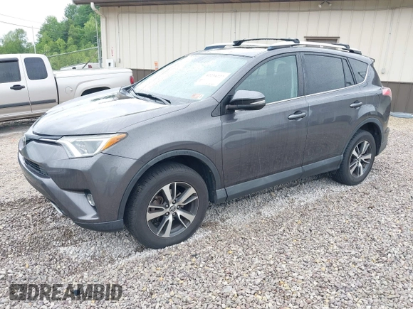 2016 Toyota RAV4 XLE with VIN 2T3RFREV4GW494108, listed as a IAAI auction lot 42234227 with 102,216 mi miles and . Bid and sale history available at DreamBid. Image 2.