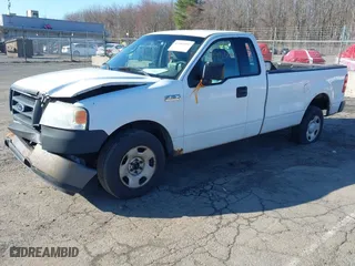 2005 Ford F-150 XL with VIN 1FTRF12285NB41452, listed as a IAAI auction lot 41903892 with 290,233 mi miles. Bid and sale history available at carsss.com. Image 2.