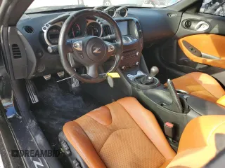 2014 Nissan 370Z z VIN JN1AZ4EH9EM636239, wystawiony jako Copart lot #69833264 z przebiegiem 110 802 mil mil oraz Szkoda całkowita • Salvage title. Historia ofert i sprzedaży dostępna na DreamBid. Obrazek 8.