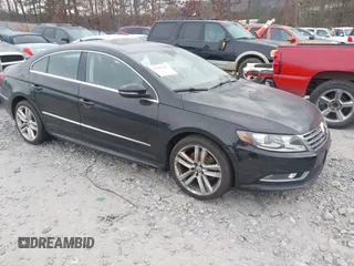 2014 Volkswagen CC Lux with VIN WVWRP7AN3EE537770, listed as a IAAI auction lot 41385247 with 135,069 mi miles. Bid and sale history available at carsss.com. Image 1.