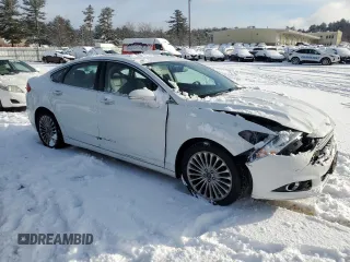 2014 Ford Fusion Titanium with VIN 3FA6P0K94ER277040, listed as a Copart auction lot 88780385 with 131,545 mi miles and Salvage Title. Bid and sale history available at DreamBid. Image 4.