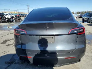 2023 Tesla Model Y Long Range with VIN 7SAYGDEE2PA047794, listed as a Copart auction lot 48397305 with 18,850 mi miles and Salvage Title. Bid and sale history available at DreamBid. Image 6.