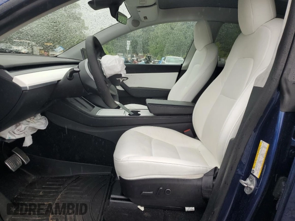 2022 Tesla Model Y Long Range z VIN 7SAYGDEE6NF318808, wystawiony jako Copart lot #57219915 z przebiegiem Nie podano mil oraz Szkoda całkowita • Salvage title. Historia ofert i sprzedaży dostępna na DreamBid. Obrazek 7.
