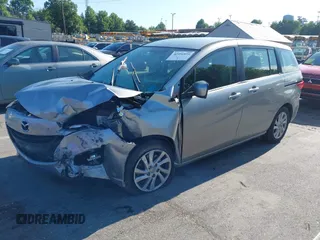 2012 Mazda 5 Sport with VIN JM1CW2BLXC0129303, listed as a IAAI auction lot 42556899 with 200,863 mi miles and . Bid and sale history available at DreamBid. Image 18.