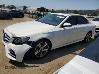 2018 Mercedes-Benz E 300 with VIN WDDZF4JB7JA468919, listed as a Copart auction lot 59406585 with 84,243 mi miles and Salvage title. Bid and sale history available at DreamBid. Image 1.