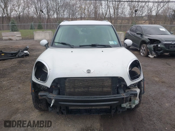 2012 MINI Countryman S with VIN WMWZC5C52CWM12275, listed as a IAAI auction lot 42014546 with 147,494 mi miles and . Bid and sale history available at DreamBid. Image 6.
