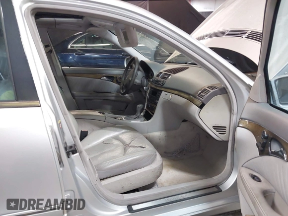 2003 Mercedes-Benz E 500 with VIN WDBUF70J03A101277, listed as a IAAI auction lot 40872555 with 330,553 mi miles and . Bid and sale history available at DreamBid. Image 5.