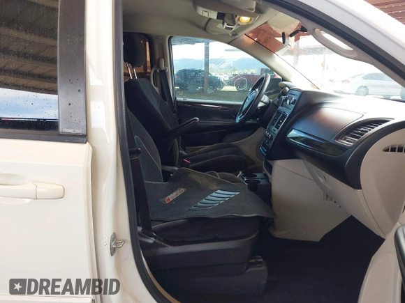 2012 Dodge Grand Caravan SE with VIN 2C4RDGBGXCR407641, listed as a IAAI auction lot 41950812 with 151,331 mi miles and . Bid and sale history available at DreamBid. Image 5.
