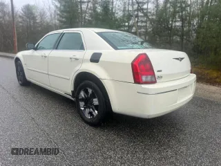 2005 Chrysler 300 Touring AWD with VIN 2C3JK53G05H695222, listed as a Copart auction lot 56255795 with Not Provided miles and Clean Title. Bid and sale history available at carsss.com. Image 3.