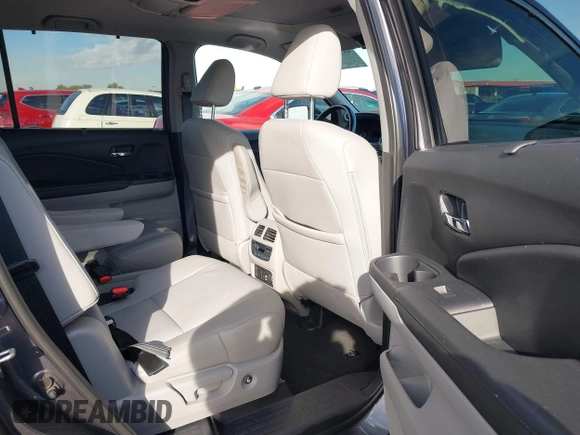 2019 Honda Pilot Touring 7-Passenger z VIN 5FNYF5H65KB020420, wystawiony jako IAAI lot #41575972 z przebiegiem 48 950 mil mil oraz . Historia ofert i sprzedaży dostępna na DreamBid. Obrazek 8.