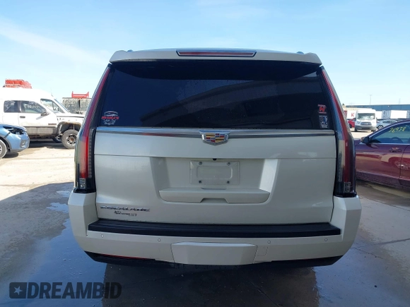 2015 Cadillac Escalade ESV Premium z VIN 1GYS4TKJ9FR700022, wystawiony jako IAAI lot #41748188 z przebiegiem 166 416 mil mil oraz . Historia ofert i sprzedaży dostępna na DreamBid. Obrazek 16.
