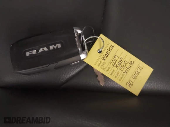 2019 Ram 1500 Tradesman z VIN 1C6RRFCG9KN677067, wystawiony jako IAAI lot #40993768 z przebiegiem 45 282 mil mil oraz . Historia ofert i sprzedaży dostępna na DreamBid. Obrazek 11.