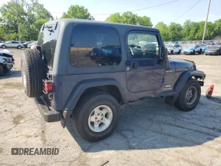 2003 Jeep Wrangler Sport z VIN 1J4FA49S13P347815, wystawiony jako Copart lot #59536685 z przebiegiem 74 298 mil mil oraz Szkoda całkowita • Salvage title. Historia ofert i sprzedaży dostępna na DreamBid. Obrazek 3.