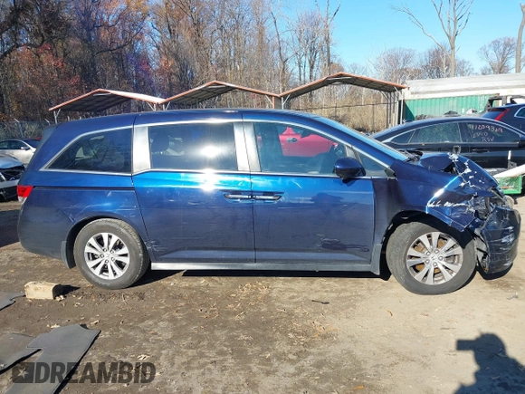 2017 Honda Odyssey SE with VIN 5FNRL5H31HB016523, listed as a IAAI auction lot 40998811 with 62,690 mi miles and . Bid and sale history available at carsss.com. Image 13.
