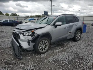 2021 Toyota RAV4 XLE Premium with VIN 2T3C1RFV5MC128285, listed as a Copart auction lot 51223615 with 71,750 mi miles and Salvage title. Bid and sale history available at DreamBid. Image 1.