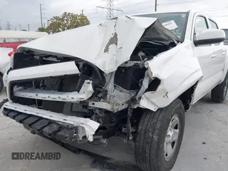 2022 Toyota Tacoma SR with VIN 3TMCZ5AN7NM470444, listed as a IAAI auction lot 41729041 with 34,248 mi miles and . Bid and sale history available at DreamBid. Image 6.