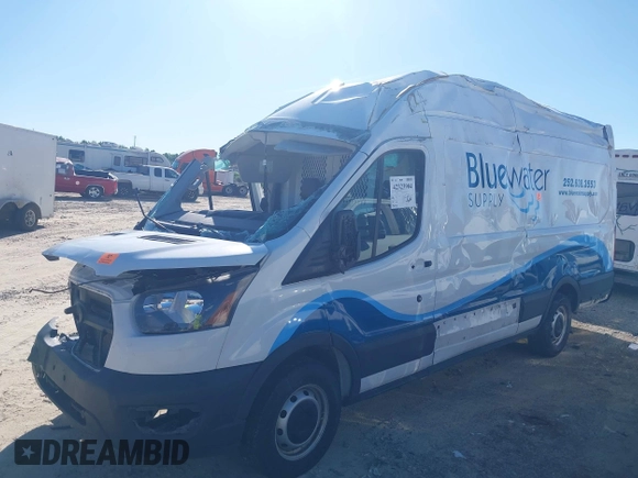 2022 Ford Transit Cargo with VIN 1FTBR3X81NKA63860, listed as a IAAI auction lot 42323904 with 94,473 mi miles and . Bid and sale history available at DreamBid. Image 2.