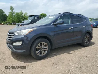 2014 Hyundai Santa Fe with VIN 5XYZU3LB8EG151194, listed as a Copart auction lot 63729405 with 148,817 mi miles and Clean title. Bid and sale history available at DreamBid. Image 1.