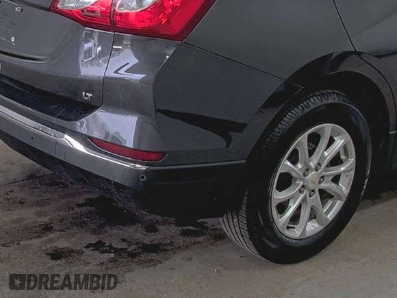 2020 Chevrolet Equinox LT z VIN 2GNAXKEV4L6236136, wystawiony jako IAAI lot #42556211 z przebiegiem 87 001 mil mil oraz . Historia ofert i sprzedaży dostępna na DreamBid. Obrazek 20.
