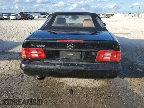 1999 Mercedes-Benz SL-Class with VIN WDBFA68F0XF186163, listed as a Copart auction lot 82669544 with 184,054 mi miles and Salvage Title. Bid and sale history available at carsss.com. Image 6.