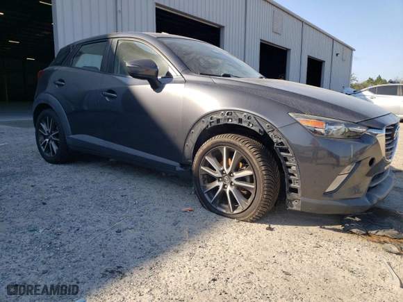 2017 Mazda CX-3 Touring with VIN JM1DKFC71H0141369, listed as a Copart auction lot 44704115 with 83,410 mi miles and Salvage Title. Bid and sale history available at carsss.com. Image 4.
