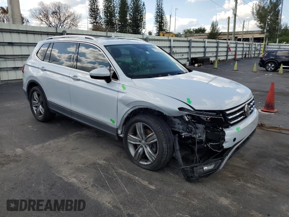 2018 Volkswagen Tiguan SEL Premium with VIN 3VV5B7AX8JM123582, listed as a Copart auction lot 51914115 with 114,549 mi miles and Salvage Title. Bid and sale history available at DreamBid. Image 4.
