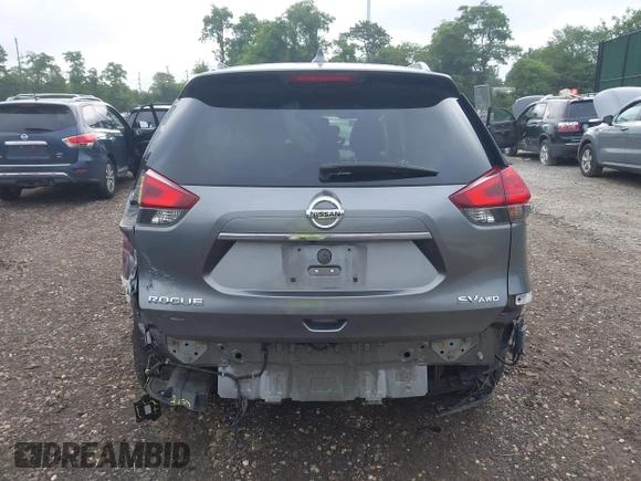 2017 Nissan Rogue S with VIN KNMAT2MV2HP581419, listed as a IAAI auction lot 42671858 with 121,308 mi miles and . Bid and sale history available at DreamBid. Image 16.