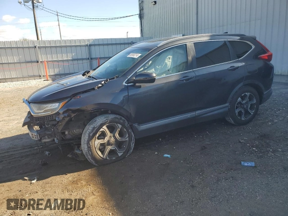 2018 Honda CR-V Touring with VIN 2HKRW1H94JH507406, listed as a Copart auction lot 86980214 with 76,527 mi miles and Salvage Title. Bid and sale history available at DreamBid. Image 1.