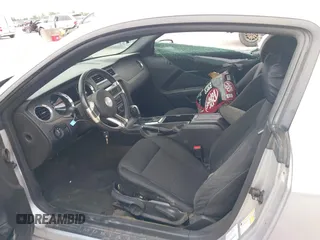 2014 Ford Mustang V6 z VIN 1ZVBP8AM3E5228599, wystawiony jako IAAI lot #42656325 z przebiegiem 185 188 mil mil oraz . Historia ofert i sprzedaży dostępna na DreamBid. Obrazek 5.