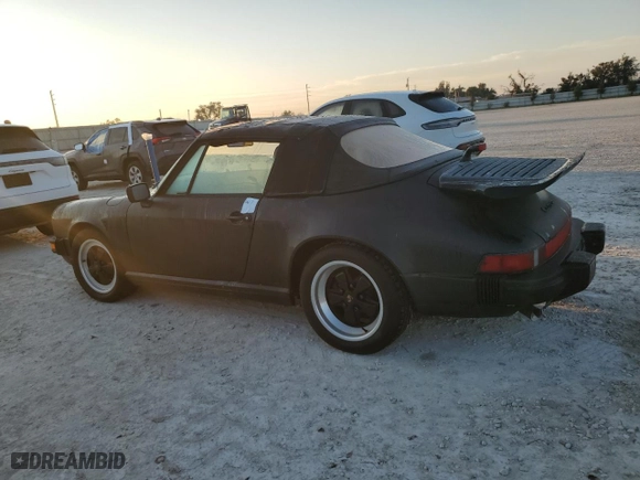 1989 Porsche 911 with VIN WP0EB0918KS171047, listed as a Copart auction lot 74635624 with 11,332 mi miles and Salvage Title. Bid and sale history available at carsss.com. Image 2.