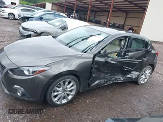 2016 Mazda 3 S Grand Touring z VIN JM1BM1N33G1277798, wystawiony jako IAAI lot #42337611 z przebiegiem 91 519 mil mil oraz . Historia ofert i sprzedaży dostępna na DreamBid. Obrazek 6.