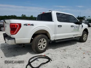 2023 Ford F-150 XL with VIN 1FTFW1E85PKG17275, listed as a Copart auction lot 57497155 with 34,379 mi miles and Salvage title. Bid and sale history available at DreamBid. Image 3.