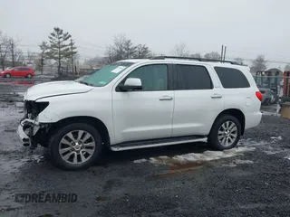 2016 Toyota Sequoia Limited with VIN 5TDJY5G18GS140071, listed as a IAAI auction lot 41570590 with 76,774 mi miles. Bid and sale history available at carsss.com. Image 14.