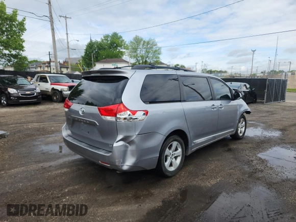 2012 Toyota Sienna LE AAS with VIN 5TDKK3DC4CS244048, listed as a Copart auction lot 55940585 with 163,222 mi miles and Clean Title. Bid and sale history available at DreamBid. Image 4.