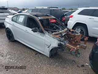 2018 BMW M3 z VIN WBS8M9C52J5K99006, wystawiony jako IAAI lot #40894548 z przebiegiem Nie podano mil oraz . Historia ofert i sprzedaży dostępna na DreamBid. Obrazek 1.